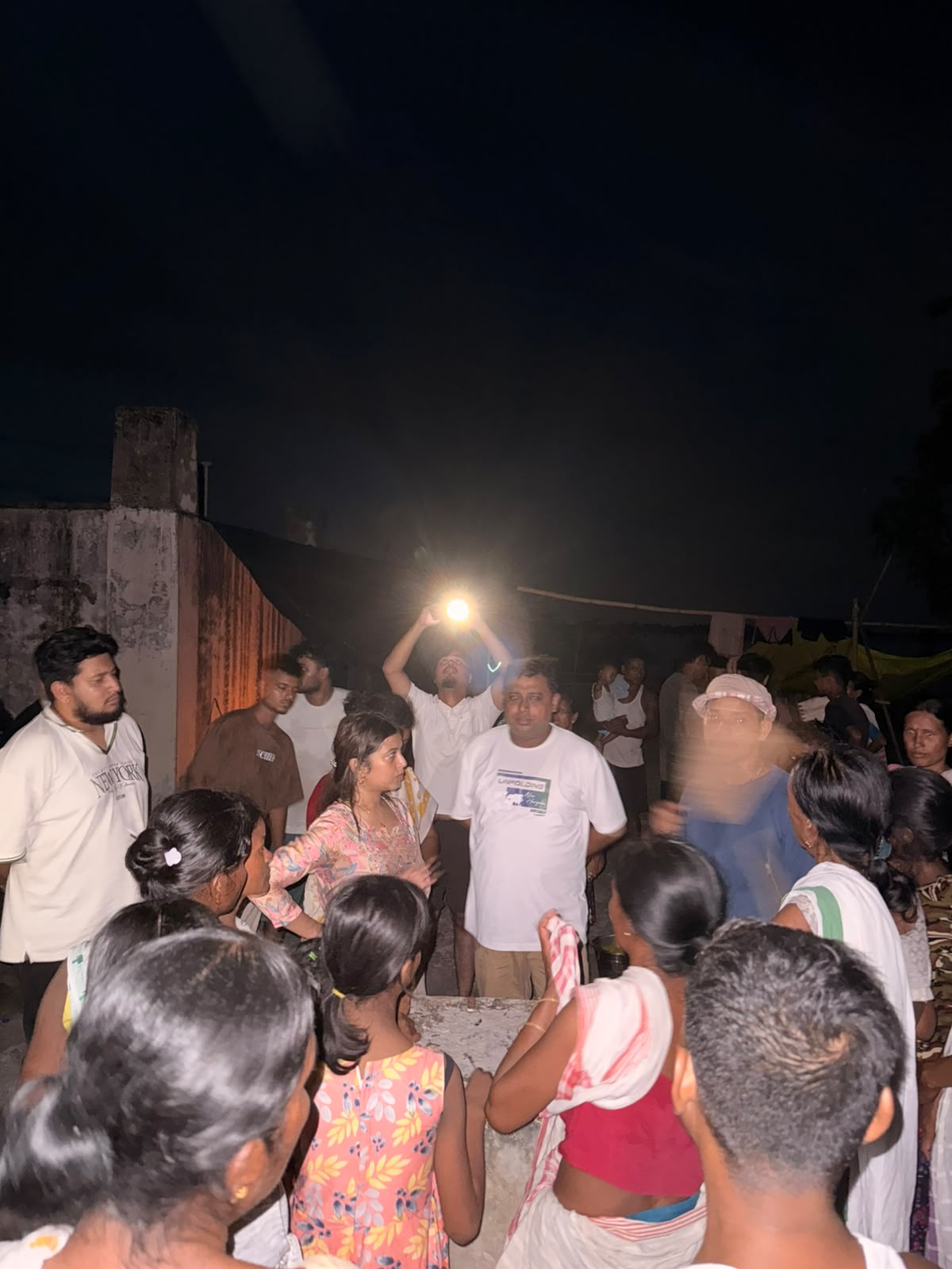 Volunteers and community members gathered during night outreach